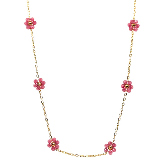 Necklace with five small pink and gold flowers on a delicate chain