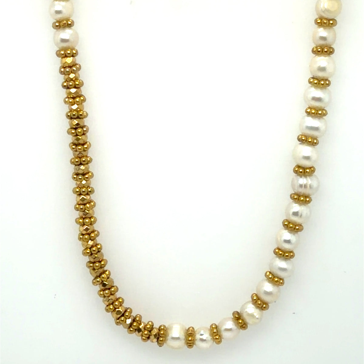 half gold halg gold with freshwater pearls in a necklace