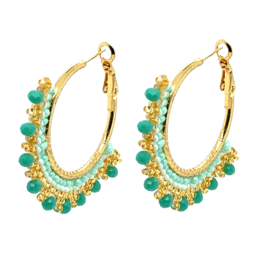 These lovely big beaded hoop earrings are green and gold