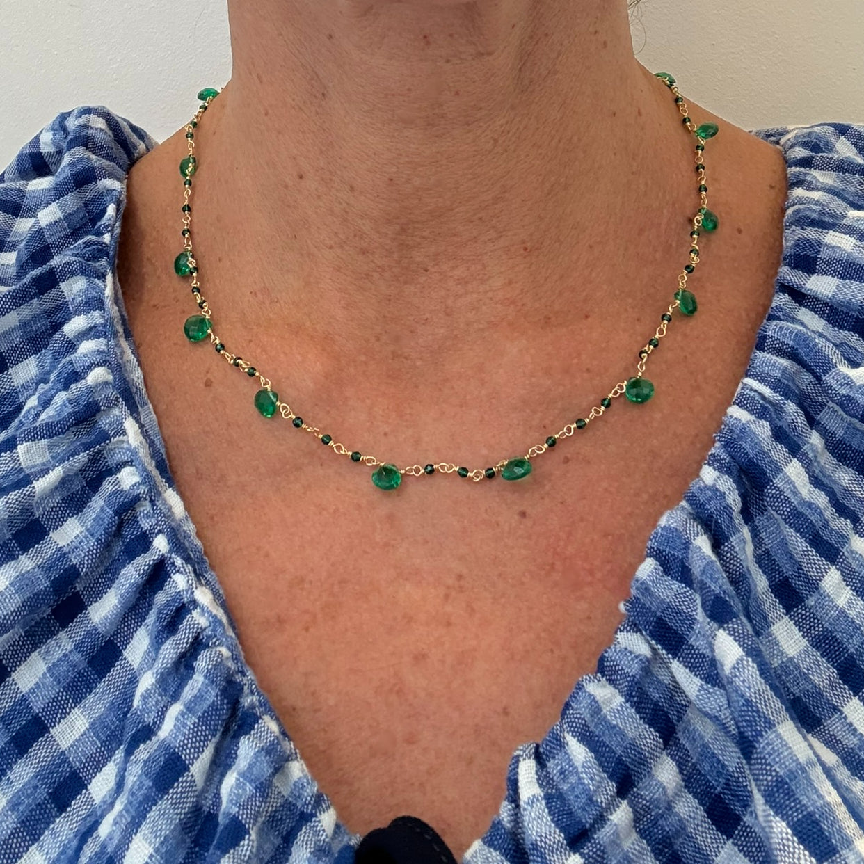 Rosary gold necklace with Green Onyx teardrop gemstone beads worn on model