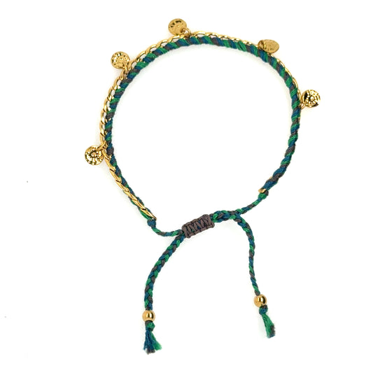 This bracelet has a gold chain interwoven with green string and gold discs dangling all around