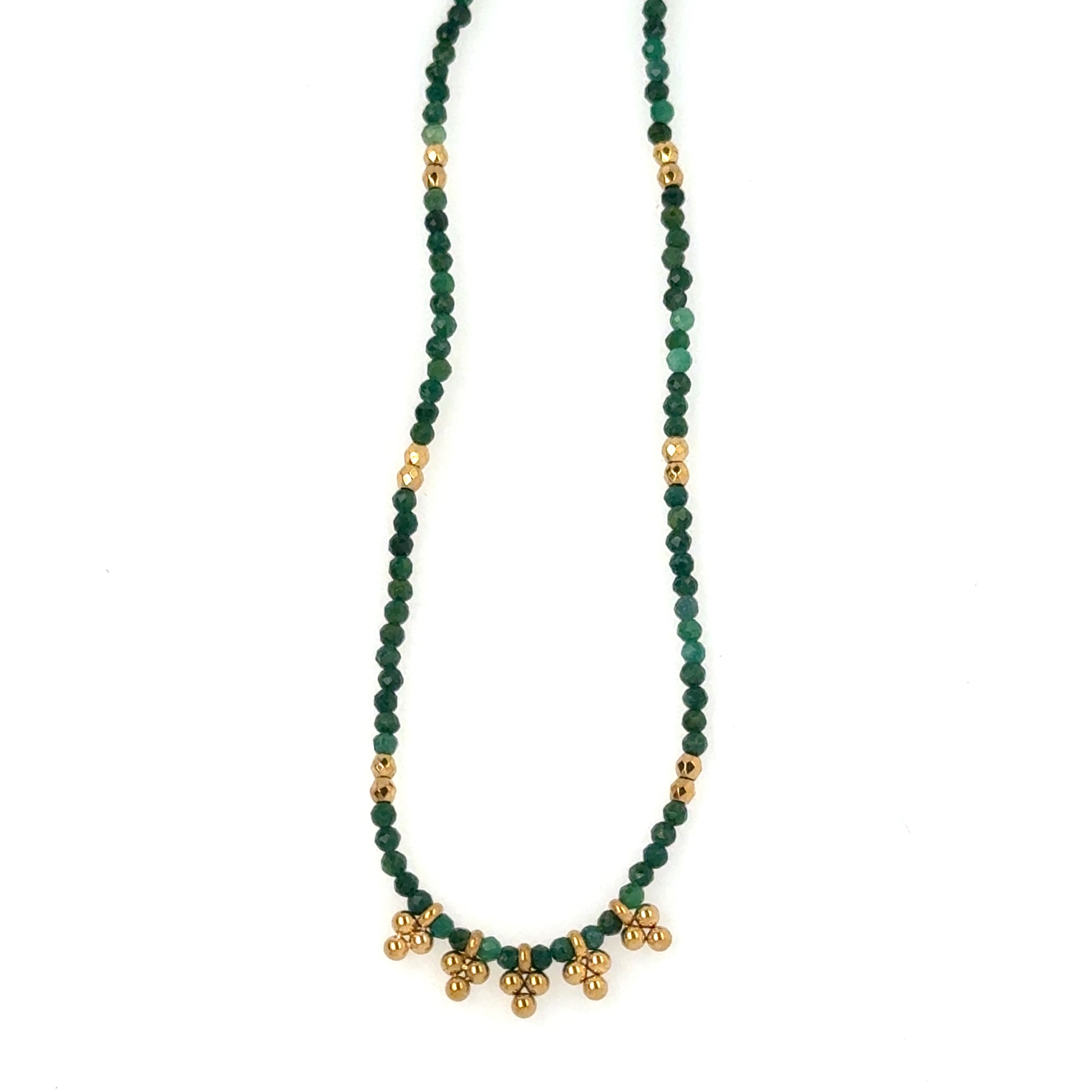 Necklace with green beads and gold accents on a white background