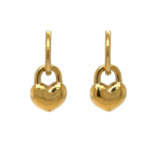 Delicate gold hoop earrings with little heart locket charms