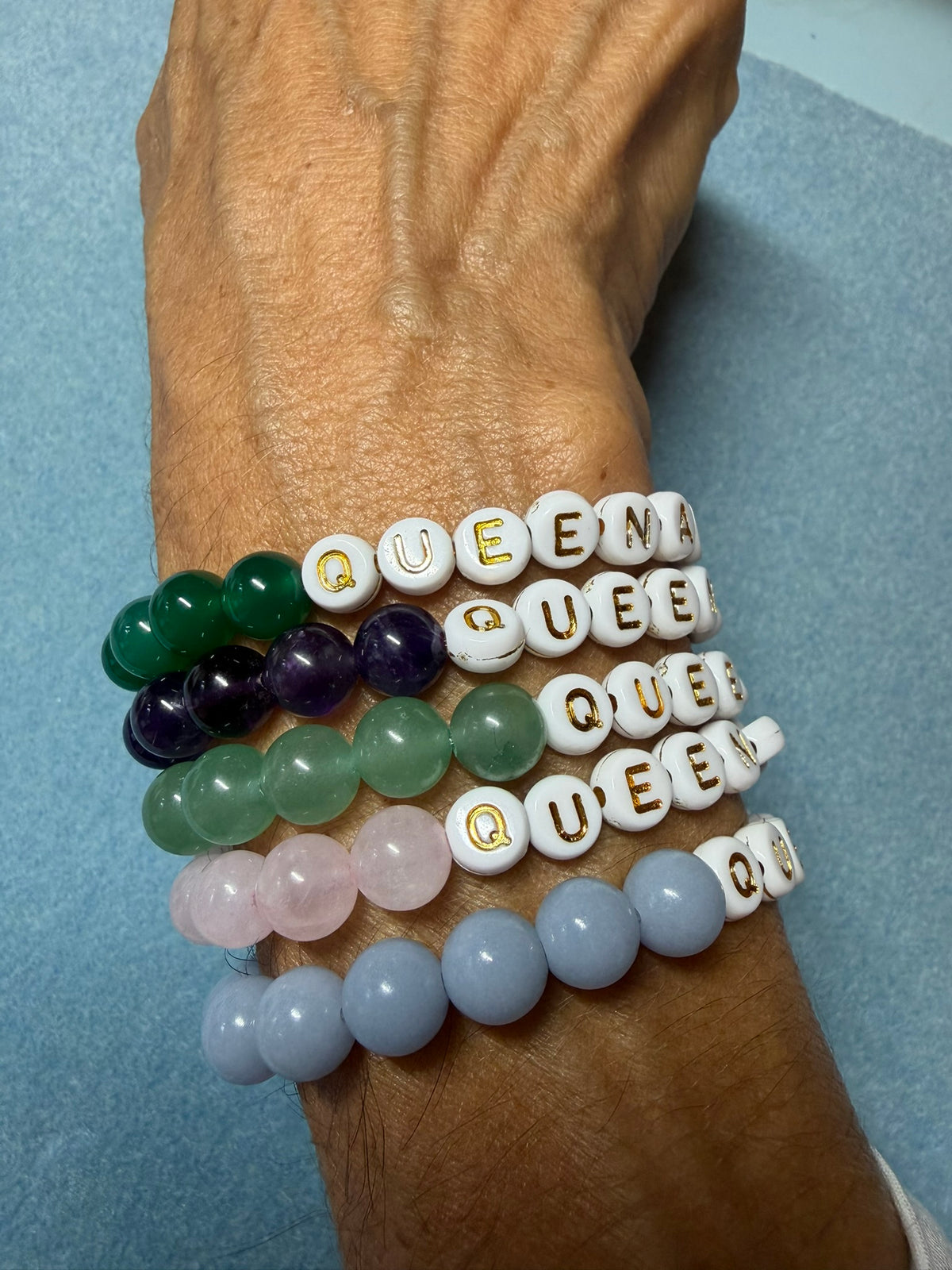 Queenager Bracelets with Gold on White Letters