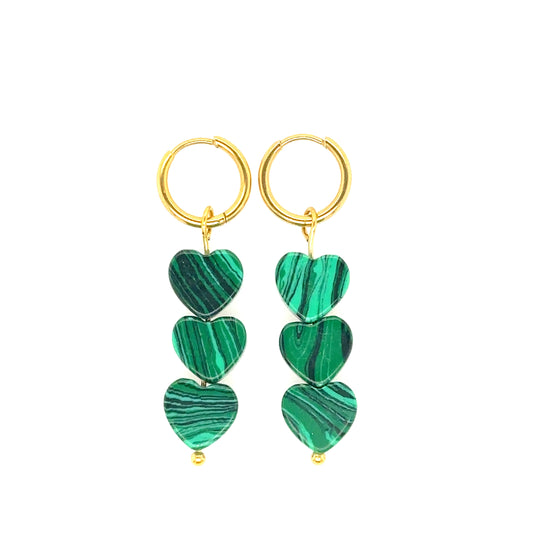 gold hoop earrings with green heart shaped charms