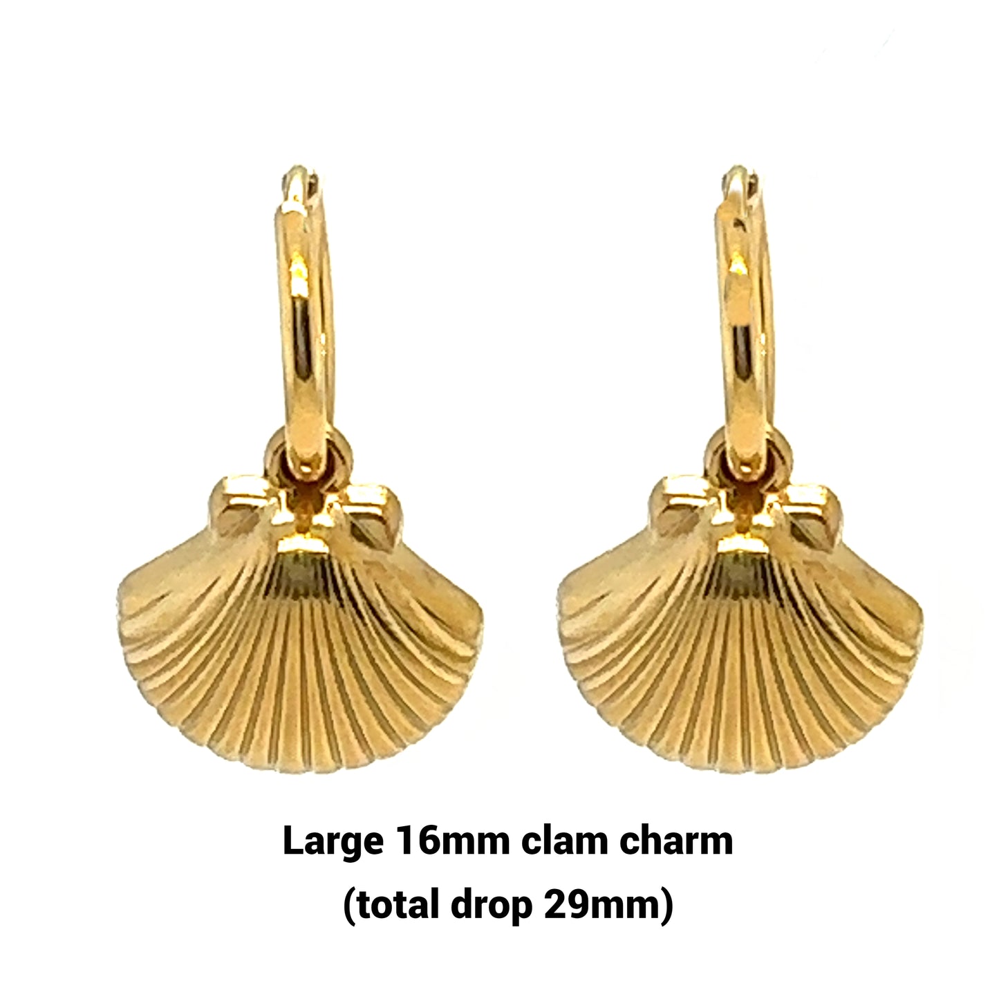 Delicate gold hoop earrings with large clam shaped charms