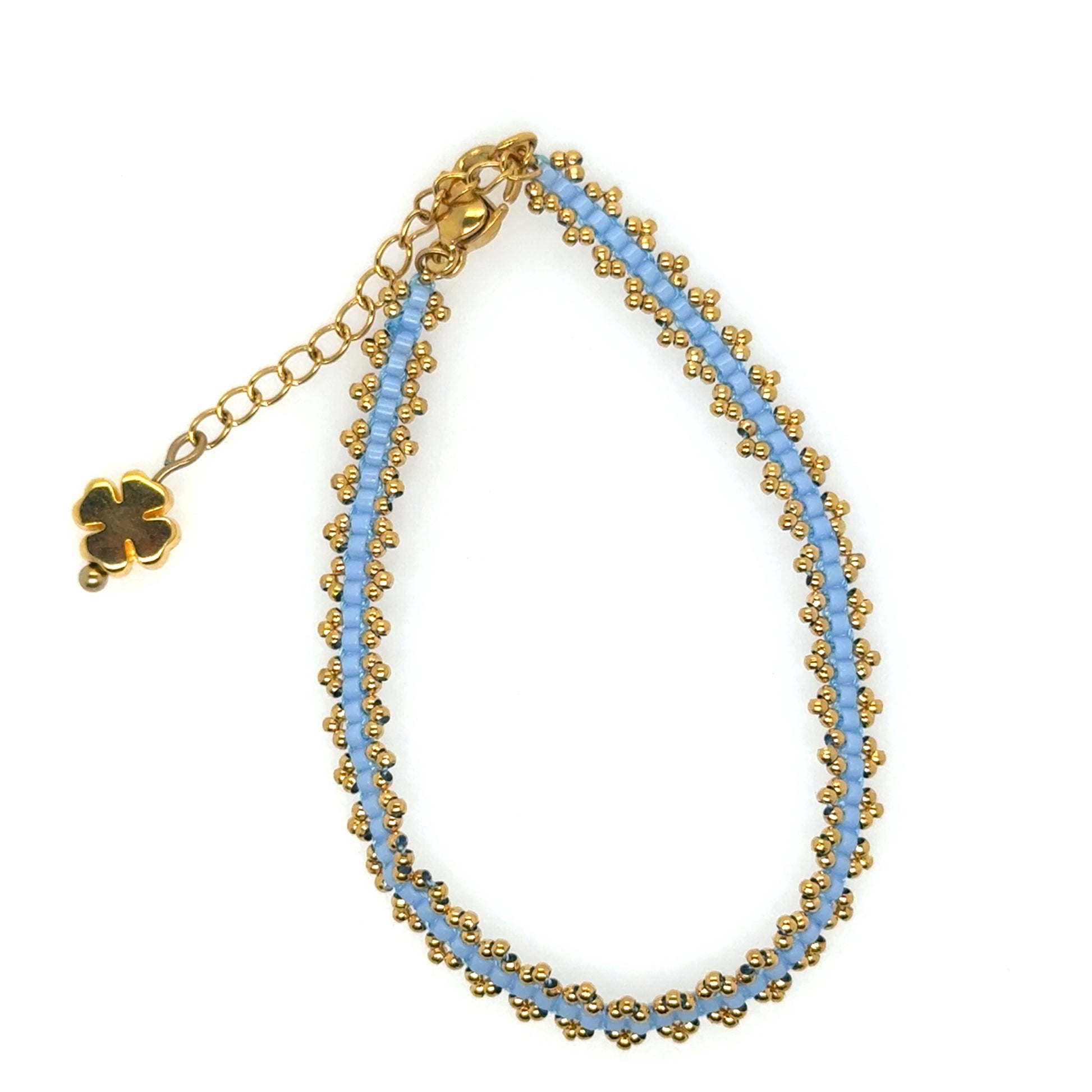 Lovely bracelet with light blue Miyuki beads woven with gold beads