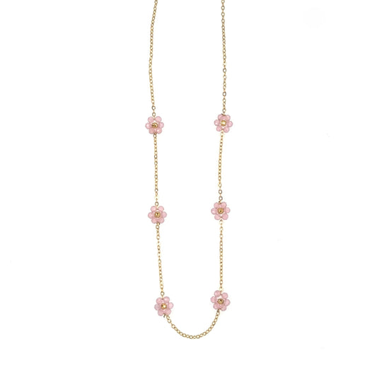 Necklace with six small light pink and gold flowers on a delicate chain