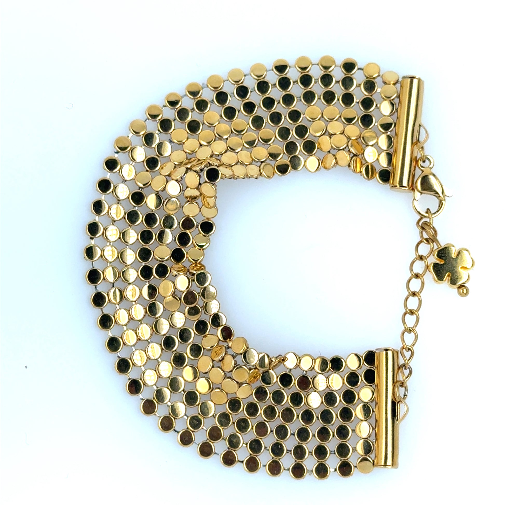 Gold mesh bracelet on a white background