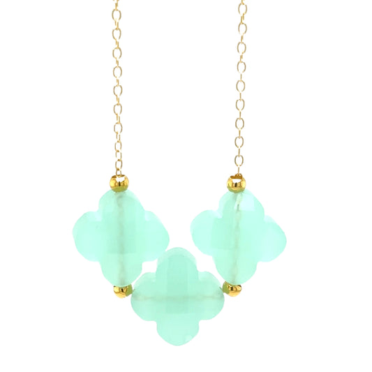 Delicate gold chain with three clover glass charms in pastel green