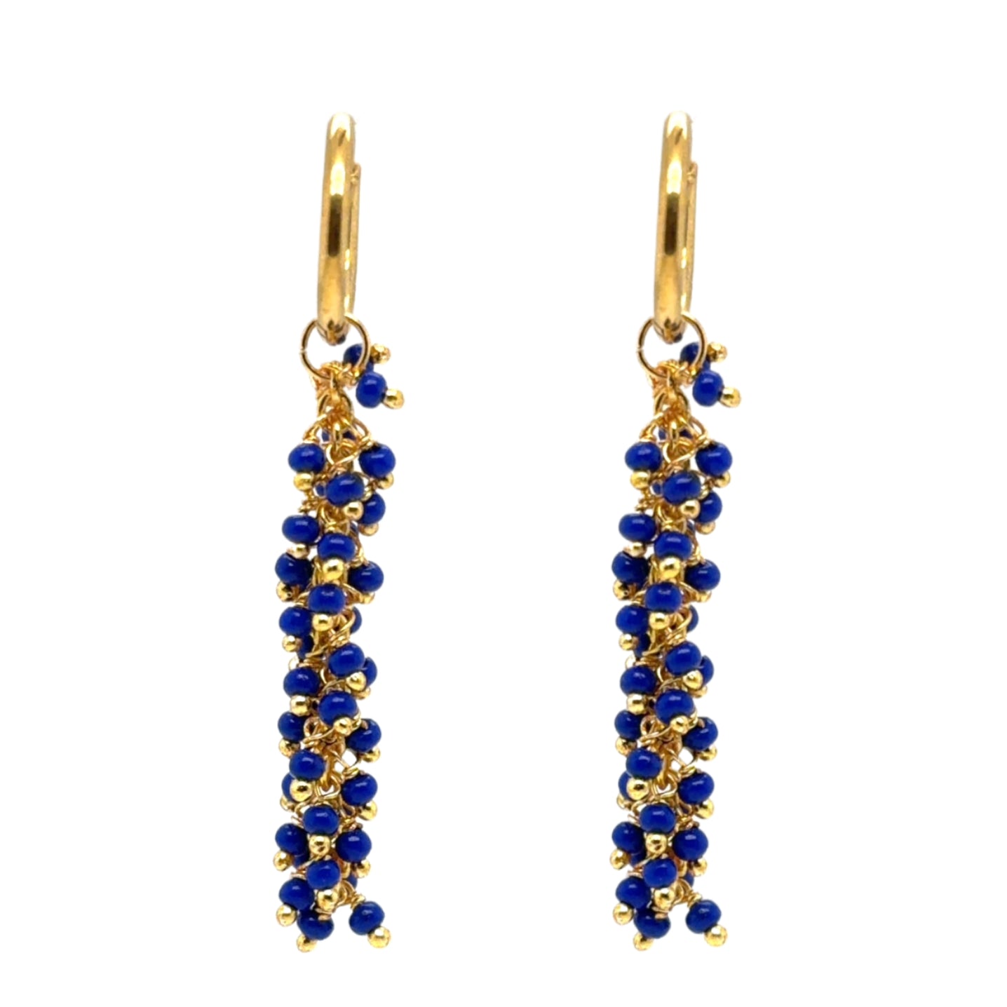 Delicate gold hoops with bright navy blue glass beads arranged in dangling clusters