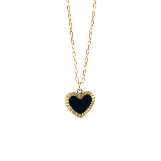 Delicate gold chain necklace with one heart shaped charm in black and gold