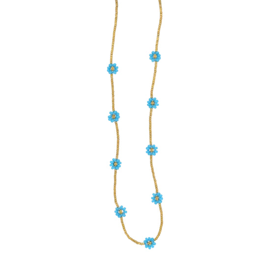 Necklace with seven small turquoise flowers on a gold bead chain