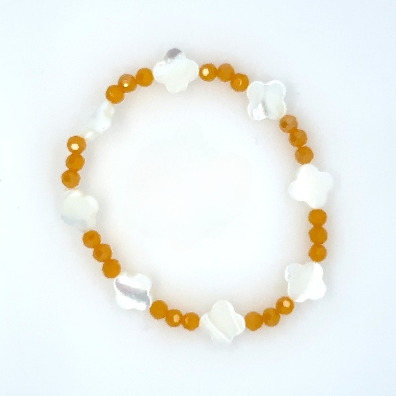 mother of pearl clover and orange beaded bracelet