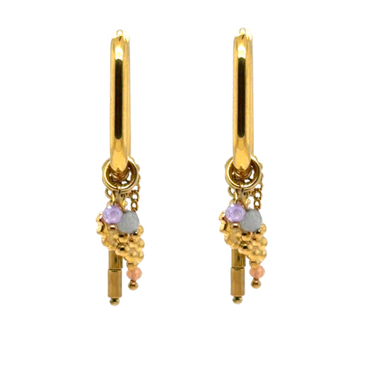 Oval gold hoop earrings with multiple gold and colourful bead charms
