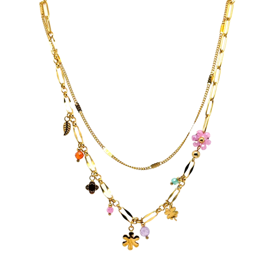 Two chain gold necklace with paperclip strand which has flower and colourful bead charms, and second plain gold chain strand.