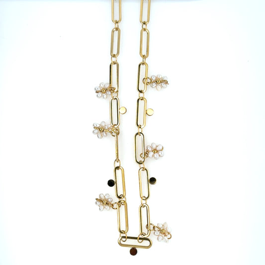 Gold paperclip style necklace with 6 dangling little pearl flowers
