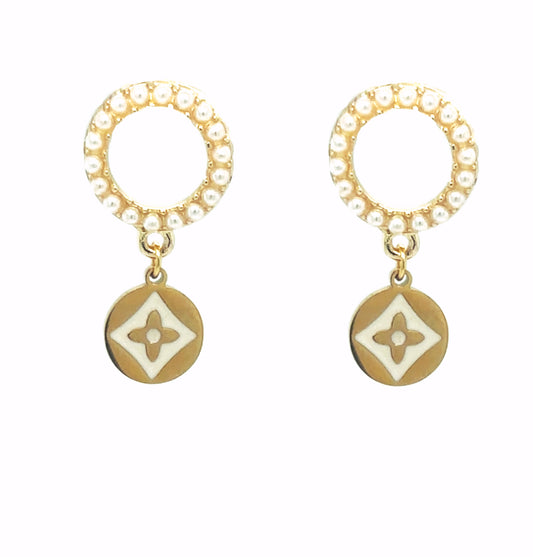 pearl and gold circle studs with dangling clover charms