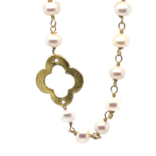 Freshwater pearl rosary chain with flat gold clover charms.