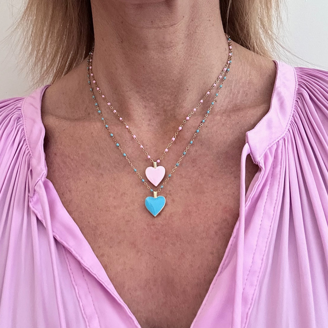 Enamel rosary gold chain necklaces with one pastel pink and turquoise blue enamel heart charms