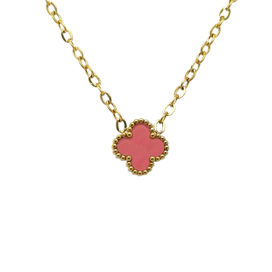 Delicate gold chain necklace with tiny 9mm pink clover charm in the middle. 