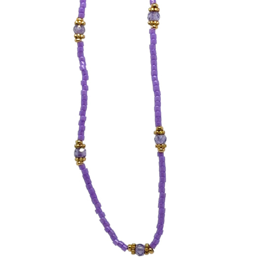Delicate necklace with tiny purple and gold beads.