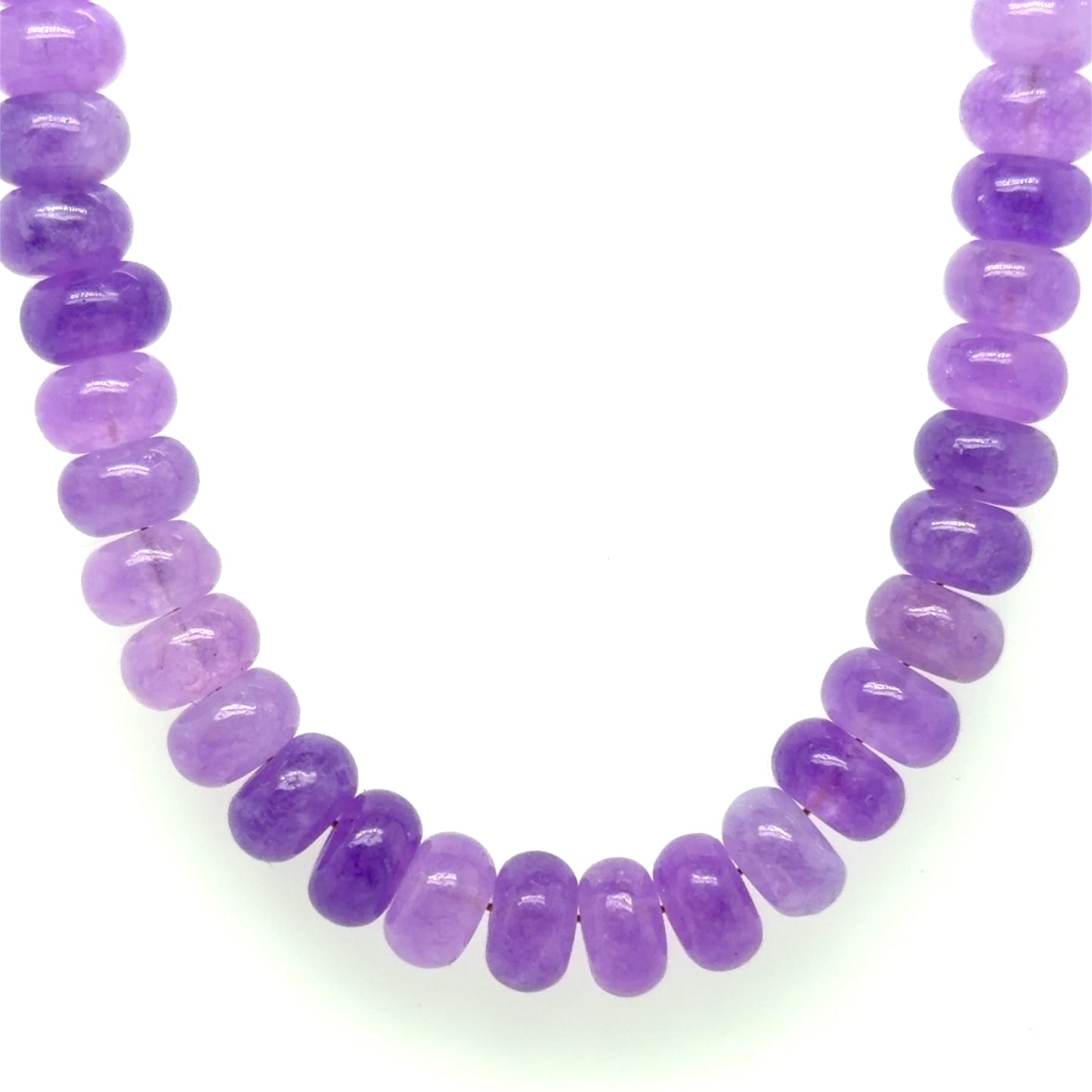Necklace with purple beads on a white background