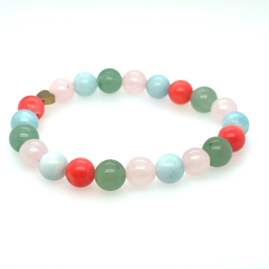 This bracelet is made with 8mm pink Sea Bamboo, Aventurine, Amanzonite, Rose Quartz gemstones and has a small Hematite heart bead on a strong stretchy elastic