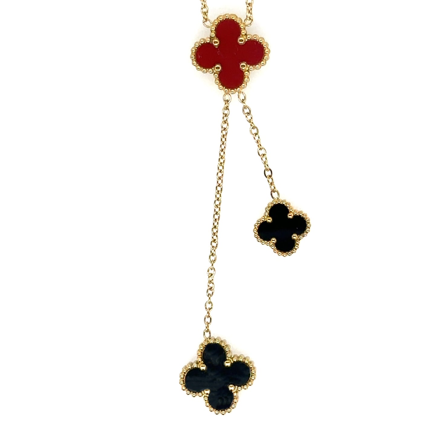 Lariat necklace with five small and medium sized reversible clover charms in black and red