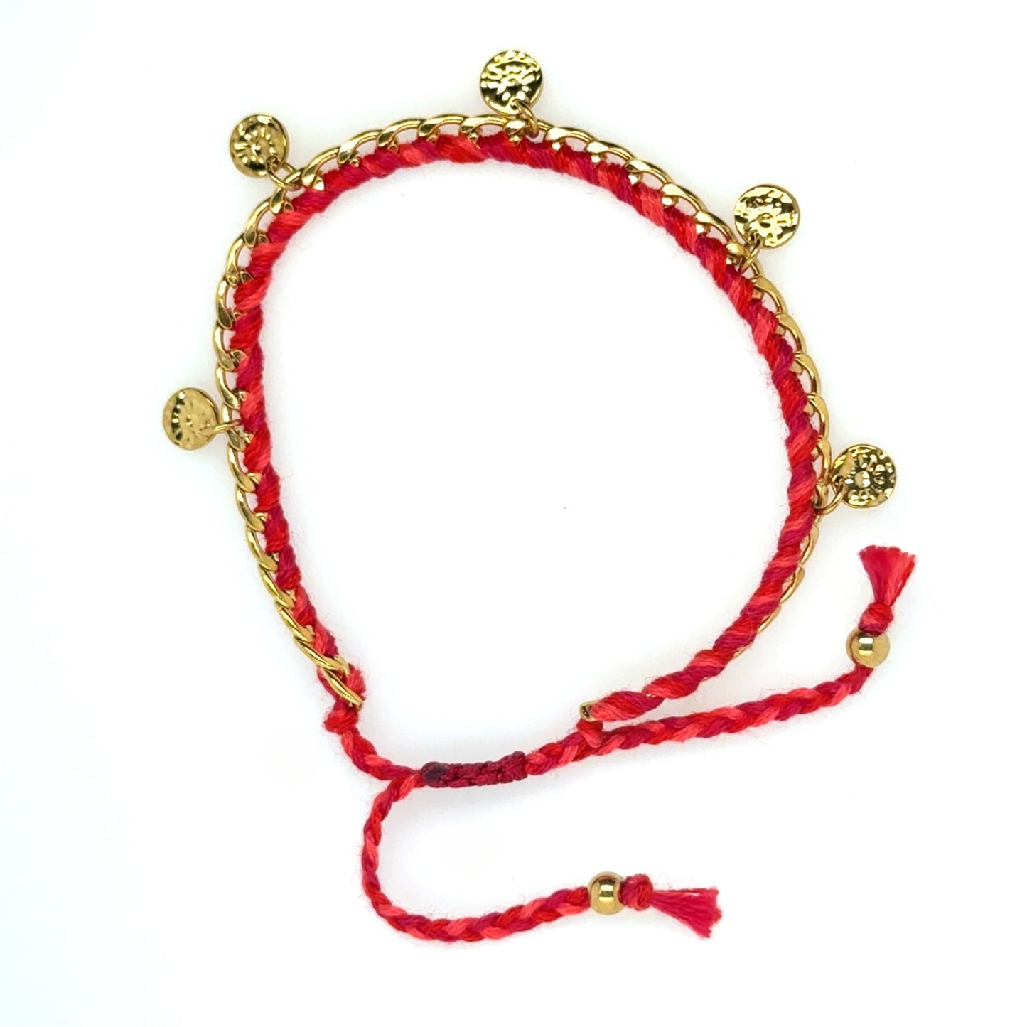 Bracelet has a gold chain interwoven with red string and gold discs dangling all around