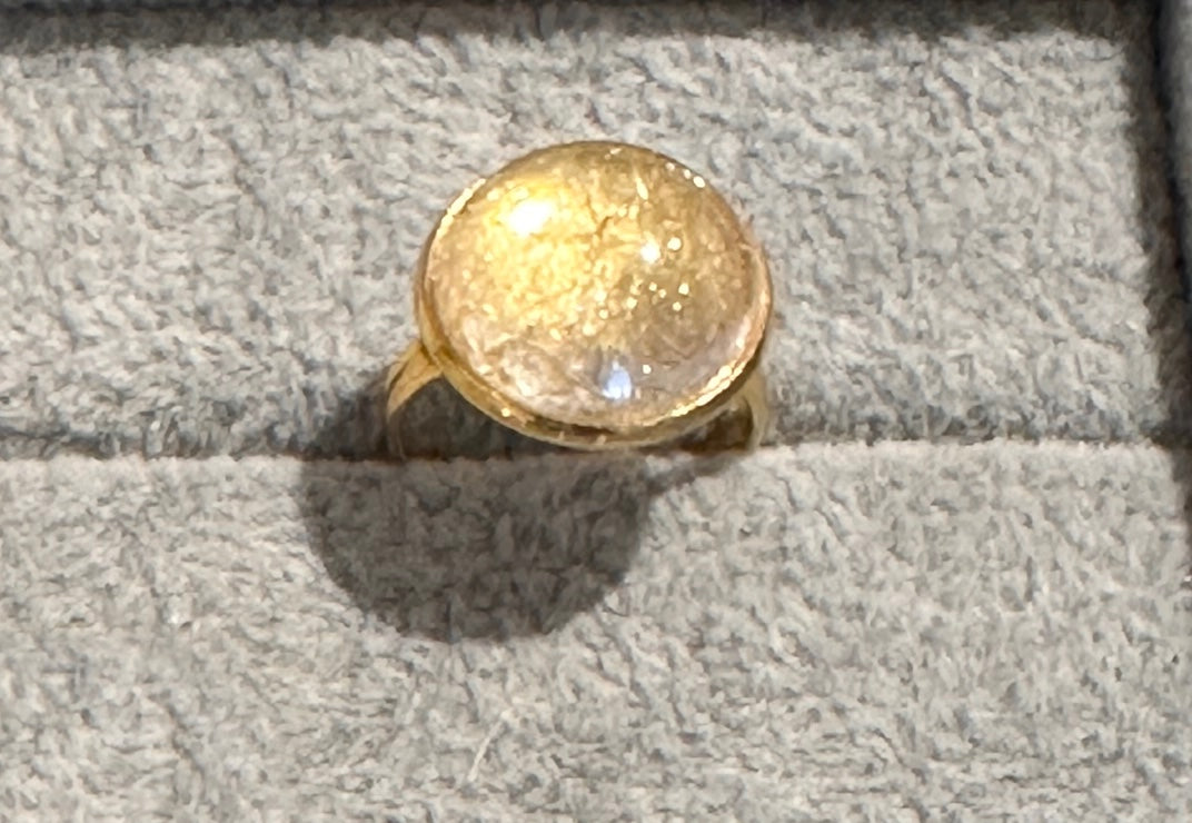 gold plated ring with rock crystal round gemstone