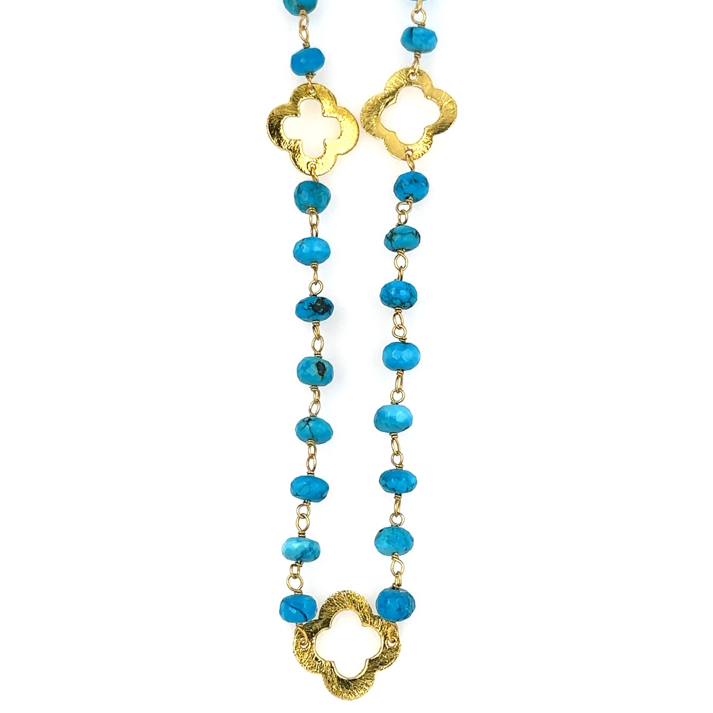 Bright turquoise gemstone rosary chain with flat gold clover charms showing 3 charms