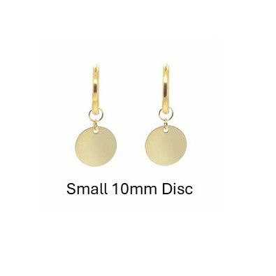 Delicate gold hoop earrings with shiny round disc gold charms that are small 10mm