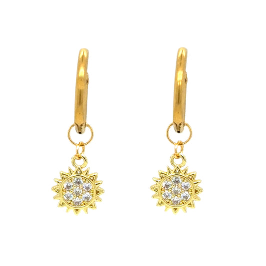 Delicate gold hoop earrings with tiny sparkly sun charms