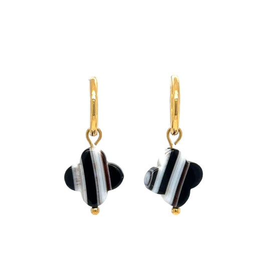 gold hoop earrings with black and white striped agate clover charms