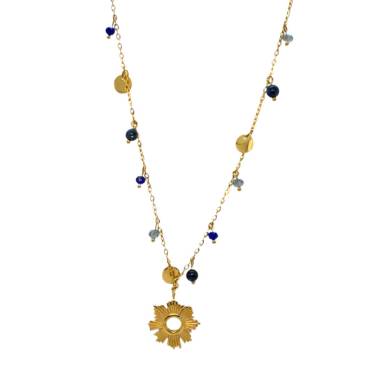 Gold necklace with delicate chain, dangling light and dark blue beads, gold discs, and lovely gold sun charm in the centre