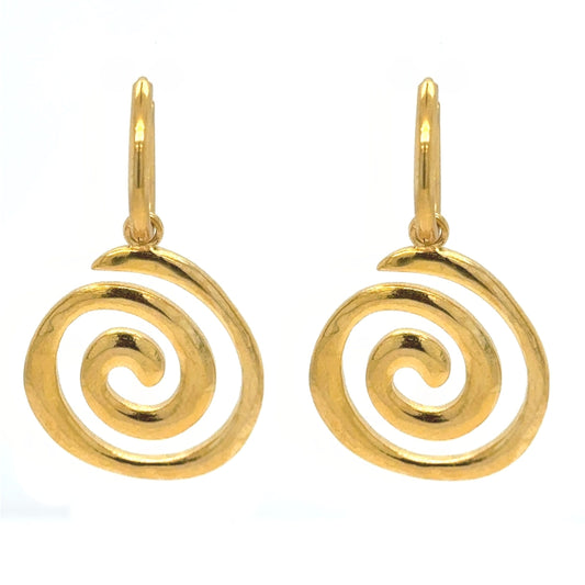 Delicate gold hoop earrings with pretty gold swirl charms