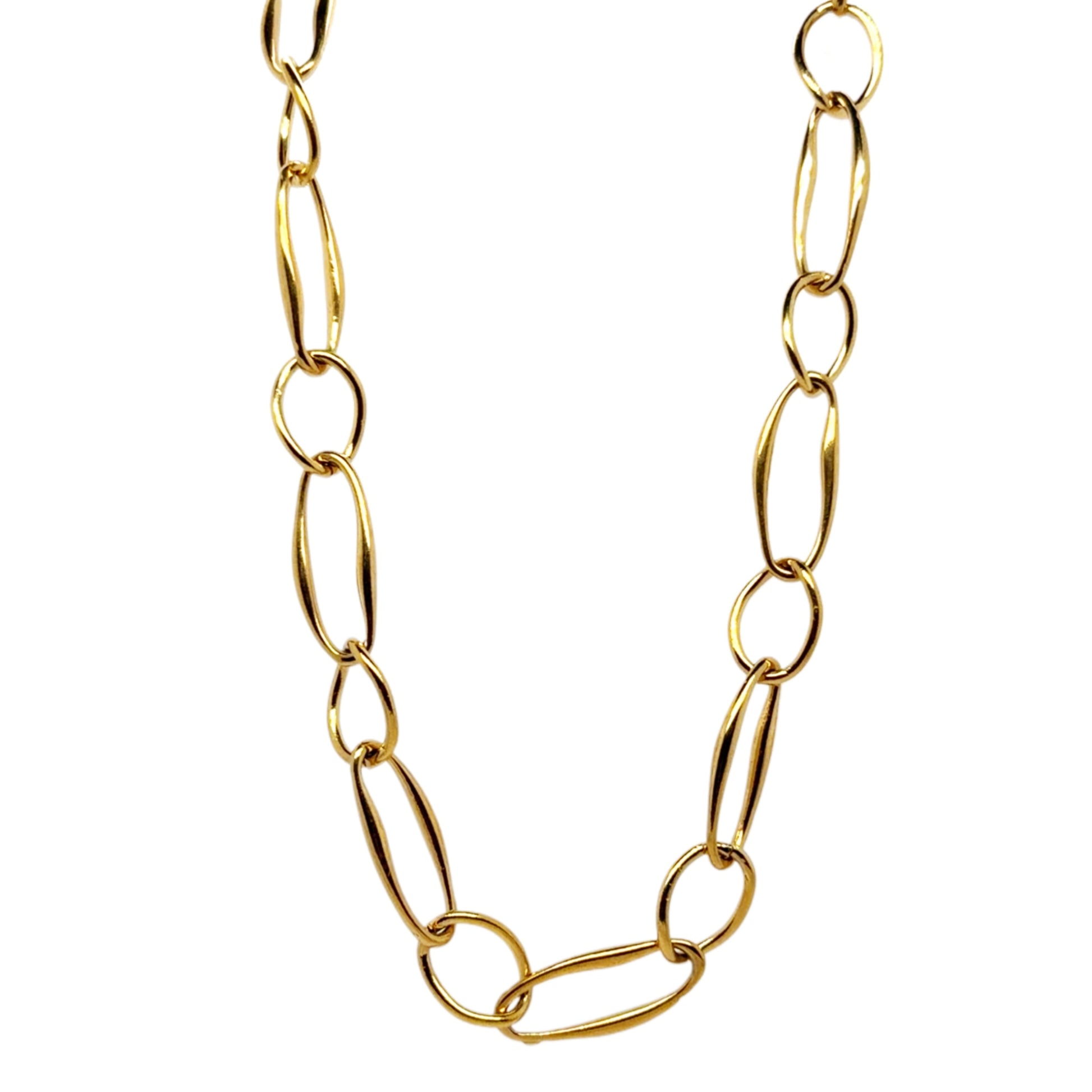 Gold chain necklace on a white background