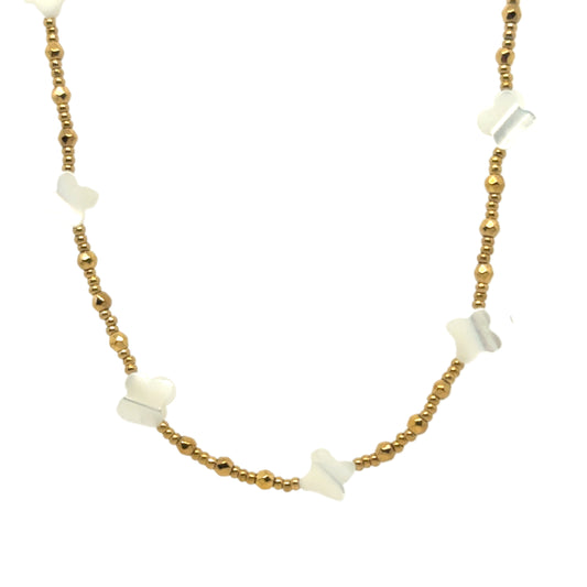 Necklace with tiny Mother of Pearl clover and gold beads
