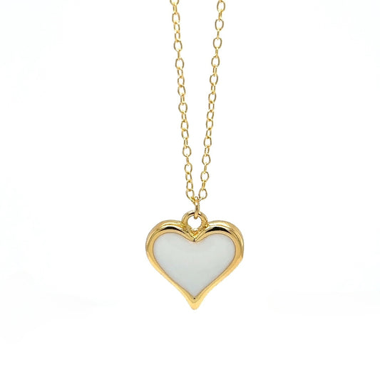 Delicate gold chain necklace with one white enamel heart charm