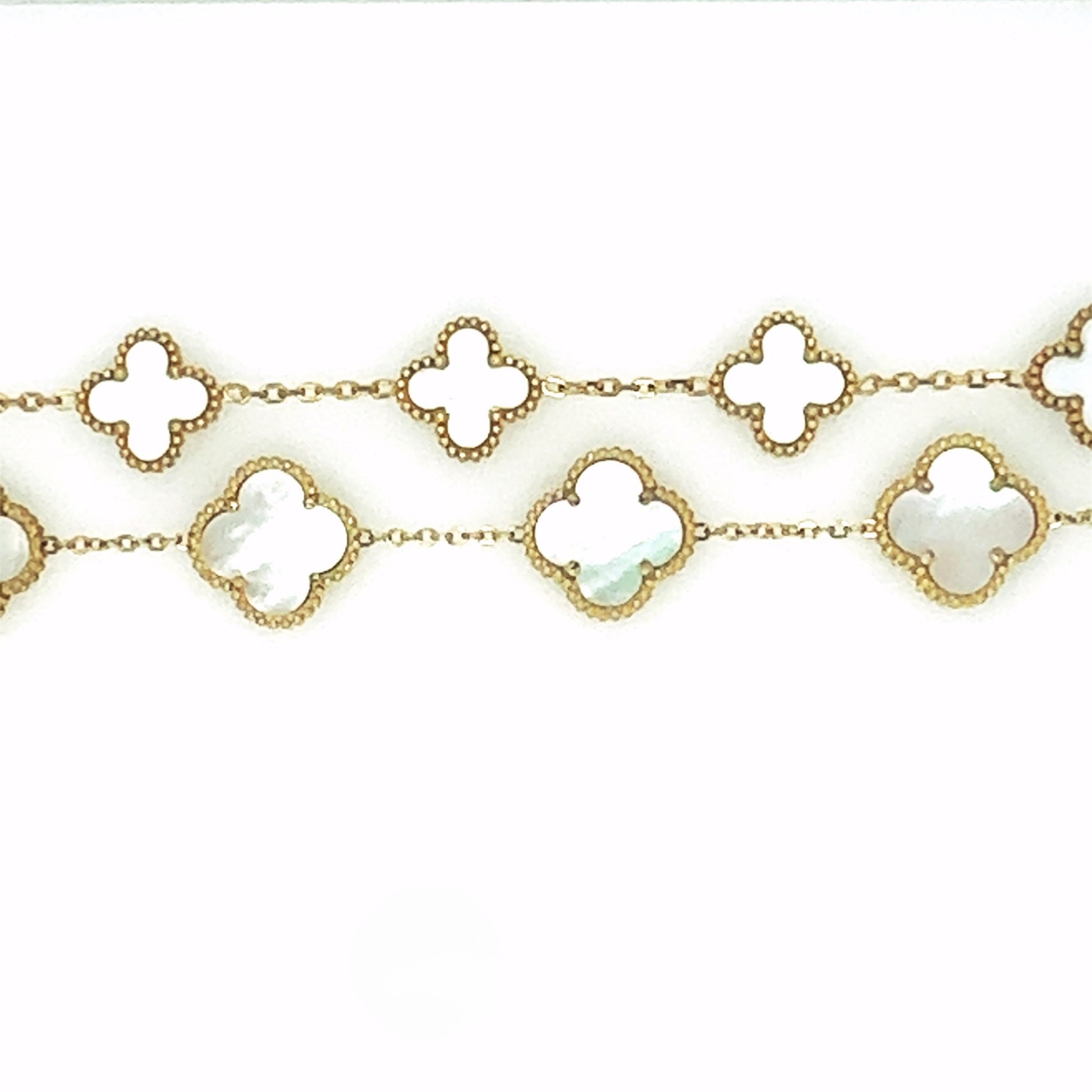 Two gold bracelets with five small and large clover charms in white mother of pearl style