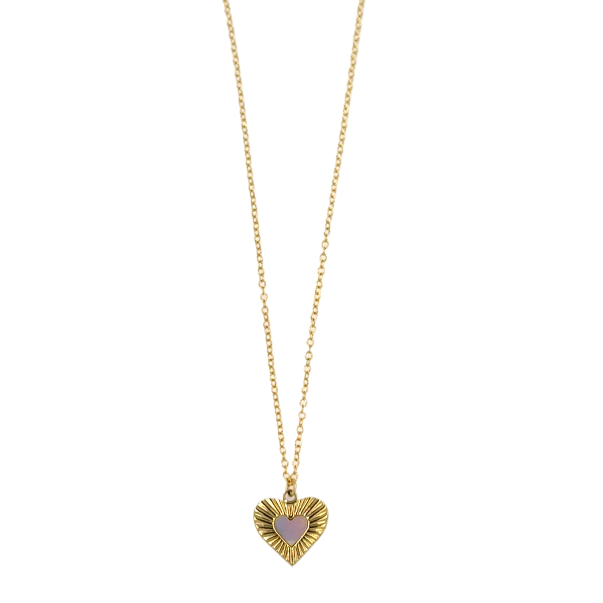 Delicate chain necklace with gold and mother of pearl heart shaped charm seen with longer chain