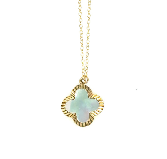 necklace with mother of pearl and gold clover charm pendant