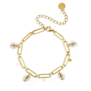 This adjustable bracelet has a paperclip gold chain with small dangling pearl flower charms