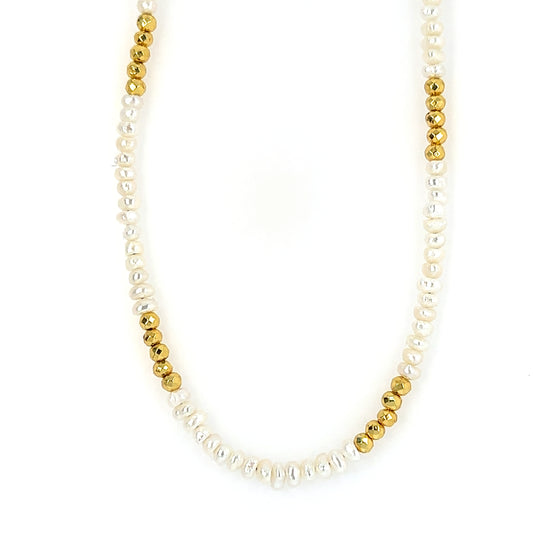 Necklace with elegant pearl and golden pyrite beads all around