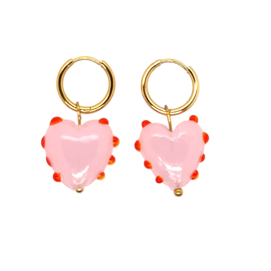 gold hoop earrings with heart shaped glass charms in pink with red