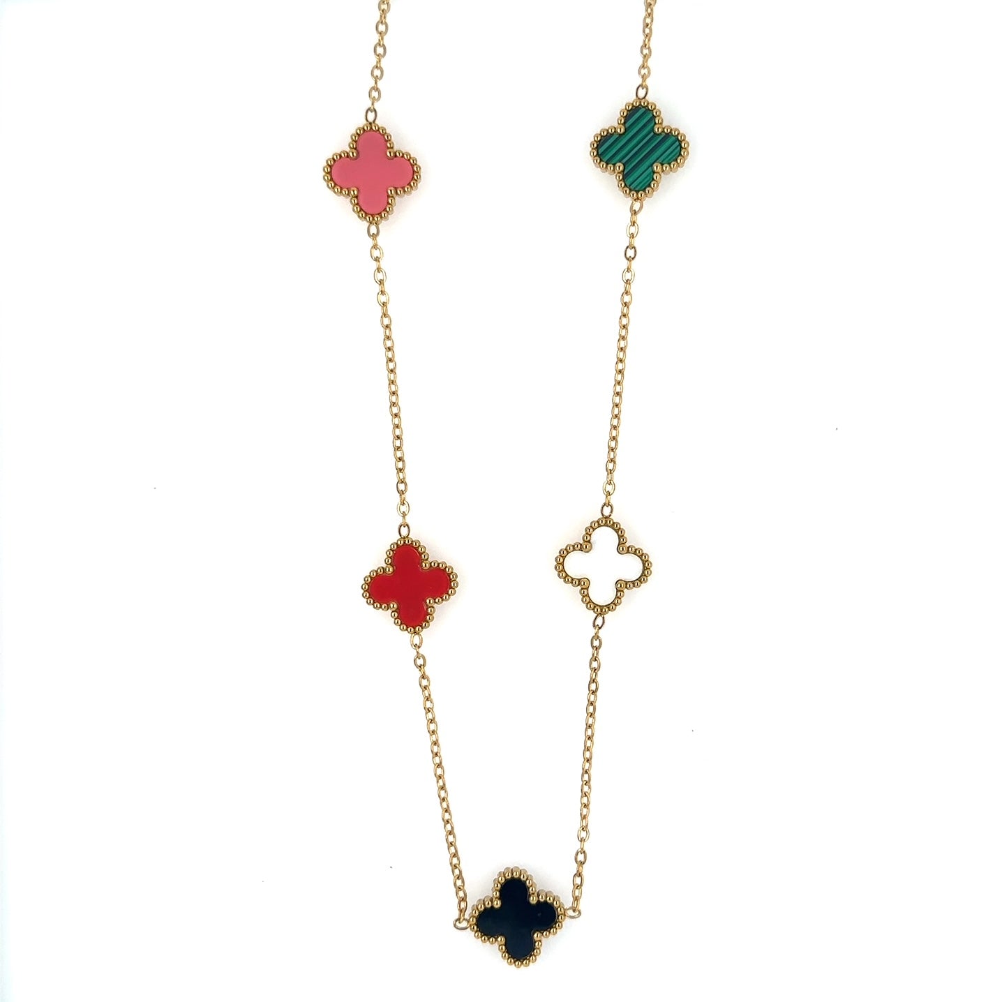 Gold chain necklace with five small clover charms in a rainbow of colours  close up