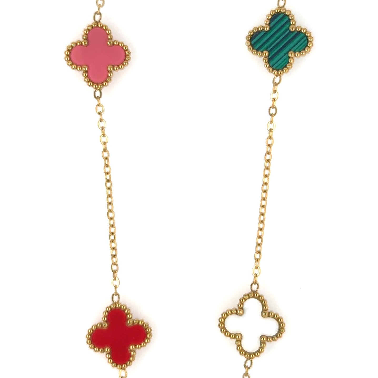 Gold chain necklace with five small clover charms in a rainbow of colours showing 4 of the colours