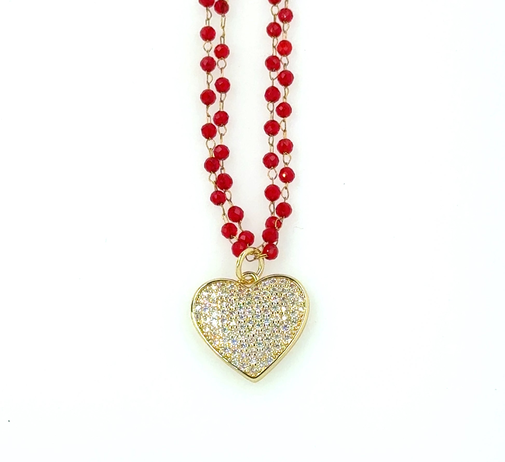 Necklace with two rows of tiny red glass beads and gold sparkly heart charm in the middle.