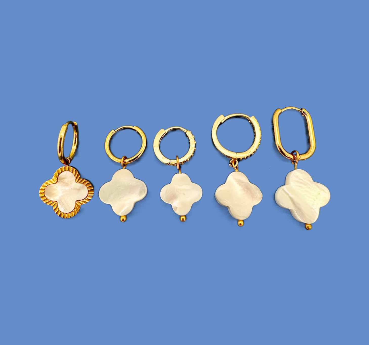 gold hoop earrings with mother of pearl shell clover charms